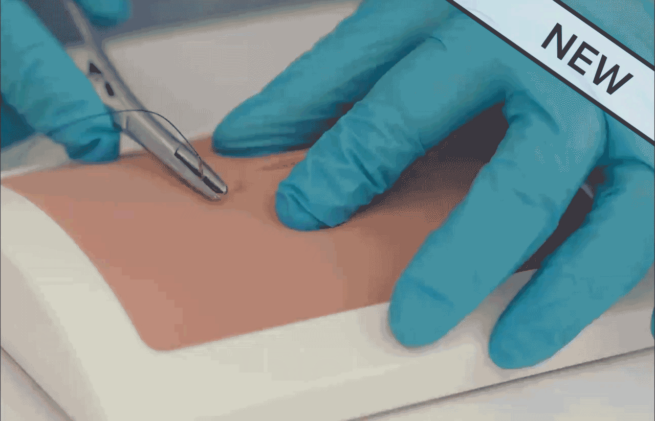 Suture practice on the skin suture trainer