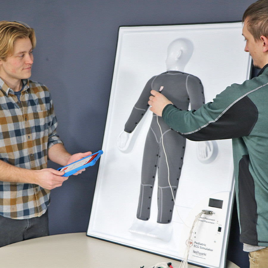 Students practicing on the Paediatric ECG Simulator