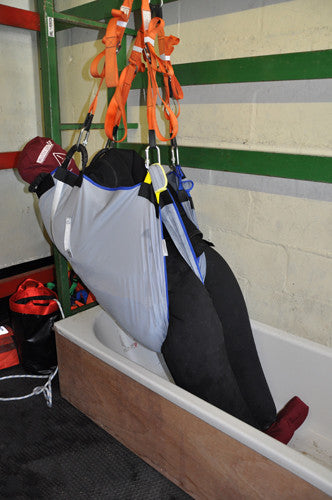 Bariatric Suit Manikin Hoisted From Bath