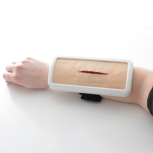 Wearable Suturing Training Pad