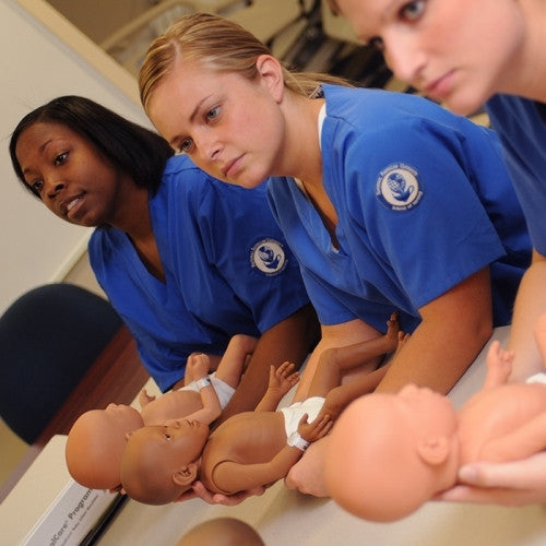 Students Learning How To Look After The RealCare Babies