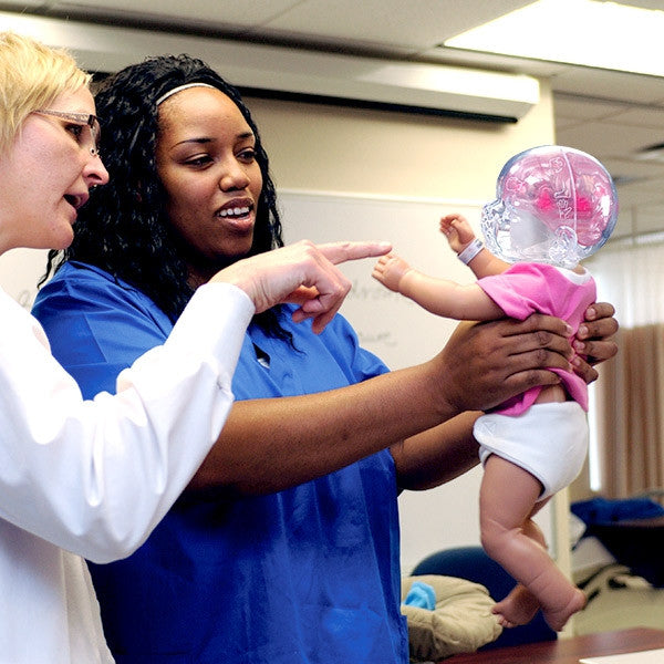 Shaken Baby RealCare Baby Simulator Being Used For Training