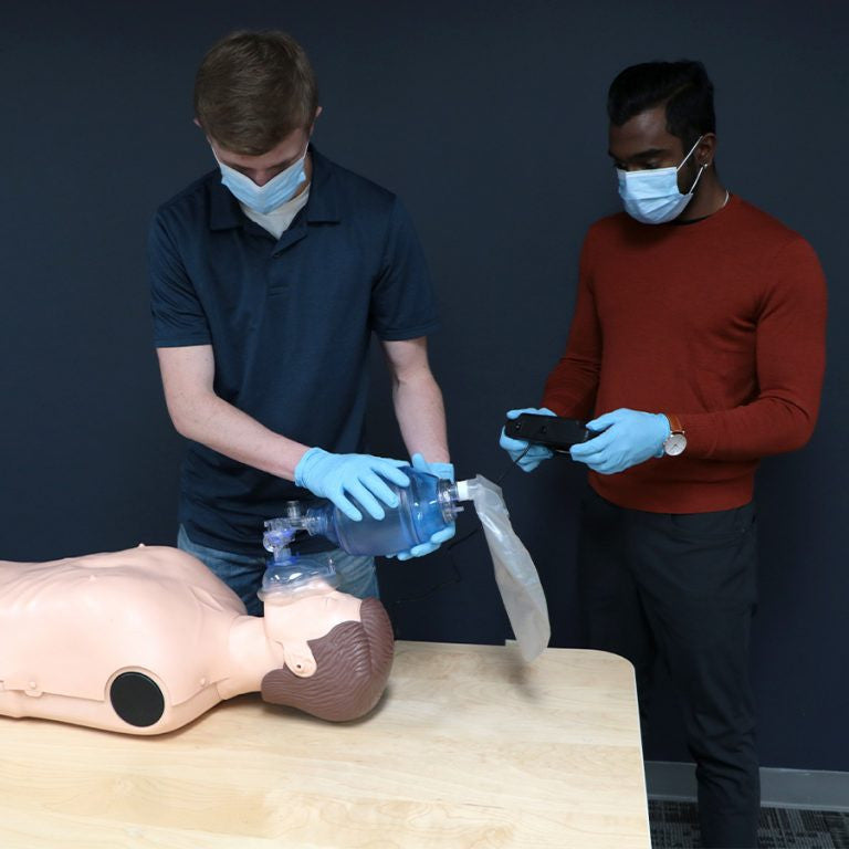 Bag, valve, mask (BVM) ventilator trainer in use
