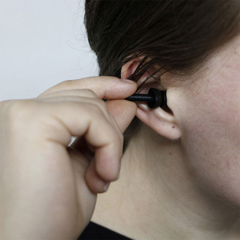 Ear plug replicating hearing loss after hemiplegia